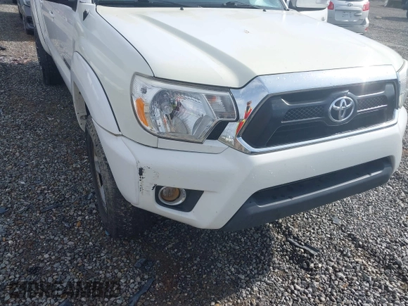 2015 Toyota Tacoma with VIN 3TMLU4EN5FM188601, listed as a IAAI auction lot 41883555 with 143,904 mi miles and . Bid and sale history available at DreamBid. Image 6.