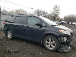 2014 Toyota Sienna LE AAS with VIN 5TDKK3DC7ES466988, listed as a Copart auction lot 53277255 with 130,706 mi miles and Salvage Title. Bid and sale history available at carsss.com. Image 4.