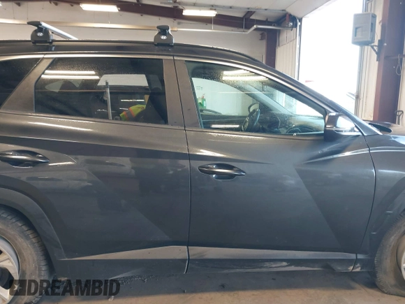 2022 Hyundai Tucson SEL with VIN 5NMJBCAE6NH035482, listed as a IAAI auction lot 41759838 with 70,418 mi miles. Bid and sale history available at carsss.com. Image 13.