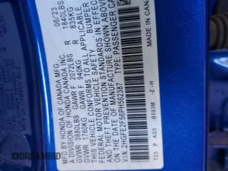 2023 Honda Civic Sport with VIN 2HGFE2F56PH562387, listed as a Copart auction lot 58408355 with 27,060 mi miles and Salvage title. Bid and sale history available at DreamBid. Image 12.