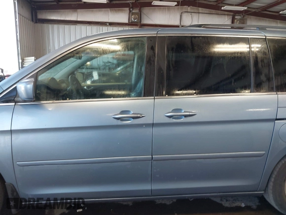 2007 Honda Odyssey EX-L z VIN 5FNRL38617B078923, wystawiony jako IAAI lot #42335122 z przebiegiem 154 352 mil mil oraz . Historia ofert i sprzedaży dostępna na DreamBid. Obrazek 14.