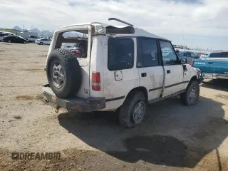 1994 Land Rover Discovery with VIN SALJY1283RA087219, listed as a Copart auction lot 52432815 with Not Provided miles and Salvage Title. Bid and sale history available at DreamBid. Image 3.