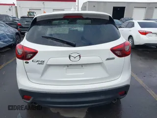2016 Mazda CX-5 Grand Touring with VIN JM3KE4DY0G0705691, listed as a IAAI auction lot 40880798 with 130,624 mi miles. Bid and sale history available at carsss.com. Image 16.