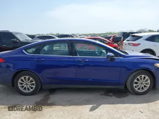 2016 Ford Fusion S z VIN 3FA6P0G7XGR263248, wystawiony jako IAAI lot #42020410 z przebiegiem 167 430 mil mil oraz . Historia ofert i sprzedaży dostępna na DreamBid. Obrazek 13.