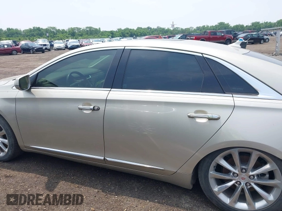 2014 Cadillac XTS Luxury z VIN 2G61M5S38E9291182, wystawiony jako IAAI lot #42495838 z przebiegiem 104 941 mil mil oraz . Historia ofert i sprzedaży dostępna na DreamBid. Obrazek 14.
