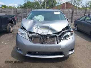 2012 Toyota Sienna XLE z VIN 5TDDK3DC5CS044692, wystawiony jako IAAI lot #42392574 z przebiegiem 185 242 mil mil oraz . Historia ofert i sprzedaży dostępna na DreamBid. Obrazek 12.