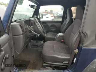 2002 Jeep Wrangler X z VIN 1J4FA39S32P767598, wystawiony jako Copart lot #55974555 z przebiegiem 177 793 mil mil oraz Czysty tytuł • Clean title. Historia ofert i sprzedaży dostępna na DreamBid. Obrazek 7.