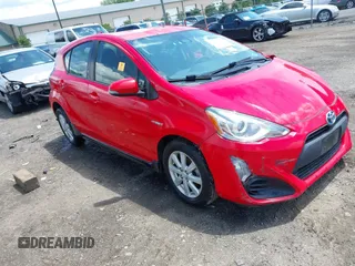 2017 Toyota Prius One z VIN JTDKDTB30H1592558, wystawiony jako IAAI lot #42652936 z przebiegiem 147 696 mil mil oraz . Historia ofert i sprzedaży dostępna na DreamBid. Obrazek 1.