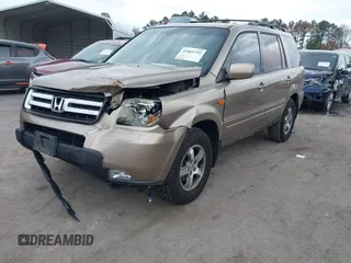 2007 Honda Pilot EX-L with VIN 5FNYF185X7B008285, listed as a IAAI auction lot 41869795 with 238,516 mi miles. Bid and sale history available at carsss.com. Image 2.