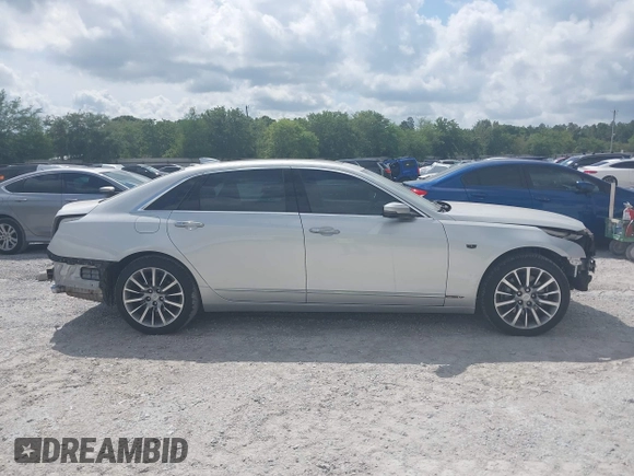 2018 Cadillac CT6 Luxury AWD z VIN 1G6KD5RS7JU101256, wystawiony jako IAAI lot #42139045 z przebiegiem 78 820 mil mil oraz . Historia ofert i sprzedaży dostępna na DreamBid. Obrazek 14.