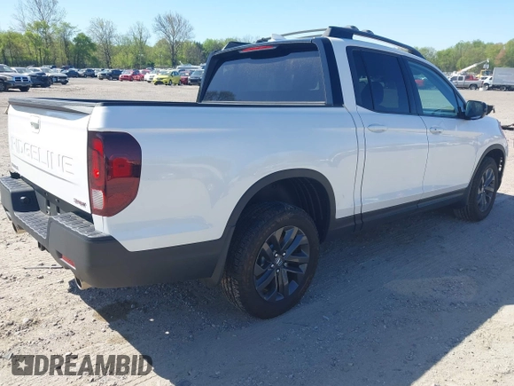 2024 Honda Ridgeline Sport z VIN 5FPYK3F11RB005065, wystawiony jako IAAI lot #42133517 z przebiegiem 4 697 mil mil oraz . Historia ofert i sprzedaży dostępna na DreamBid. Obrazek 4.