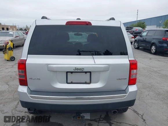 2014 Jeep Patriot Limited with VIN 1C4NJRCB0ED504715, listed as a IAAI auction lot 42080254 with 198,380 mi miles. Bid and sale history available at carsss.com. Image 16.