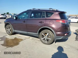 2018 Toyota RAV4 XLE with VIN 2T3WFREVXJW457073, listed as a Copart auction lot 62339635 with 75,321 mi miles and Salvage title. Bid and sale history available at DreamBid. Image 2.