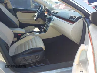 2010 Volkswagen CC with VIN WVWEU7ANXAE541722, listed as a IAAI auction lot 41825628 with 84,426 mi miles and . Bid and sale history available at DreamBid. Image 5.