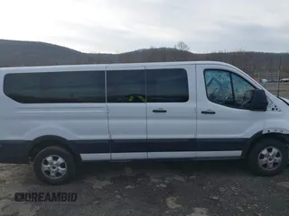 2019 Ford Transit Passenger XL z VIN 1FBZX2ZM2KKB63281, wystawiony jako IAAI lot #41859263 z przebiegiem 39 294 mil mil oraz . Historia ofert i sprzedaży dostępna na DreamBid. Obrazek 13.