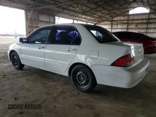 2002 Mitsubishi Lancer ES with VIN JA3AJ26E22U029638, listed as a Copart auction lot 49445635 with 304,063 mi miles and Salvage Title. Bid and sale history available at carsss.com. Image 2.