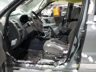 2005 Ford Escape Hybrid with VIN 1FMCU96H55KB87200, listed as a Copart auction lot 44643455 with Not provided miles and Salvage title. Bid and sale history available at DreamBid. Image 7.