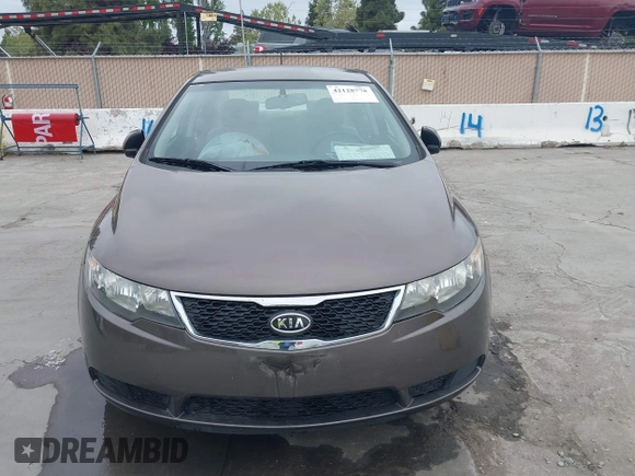 2013 Kia Forte EX with VIN KNAFU4A22D5711825, listed as a IAAI auction lot 42128778 with 112,889 mi miles. Bid and sale history available at carsss.com. Image 6.