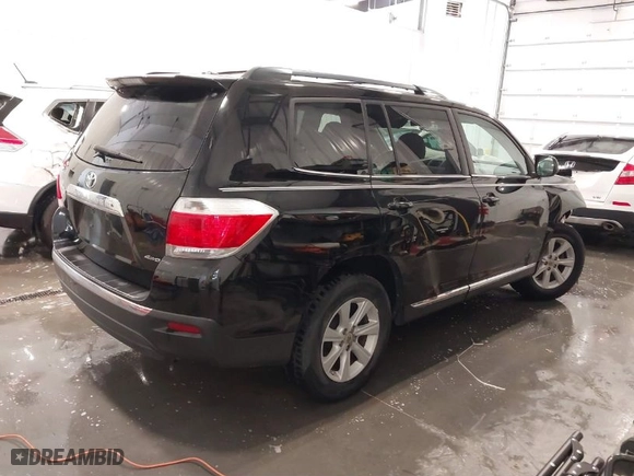 2012 Toyota Highlander with VIN 5TDBK3EH2CS163379, listed as a IAAI auction lot 41807409 with 202,554 mi miles. Bid and sale history available at carsss.com. Image 4.