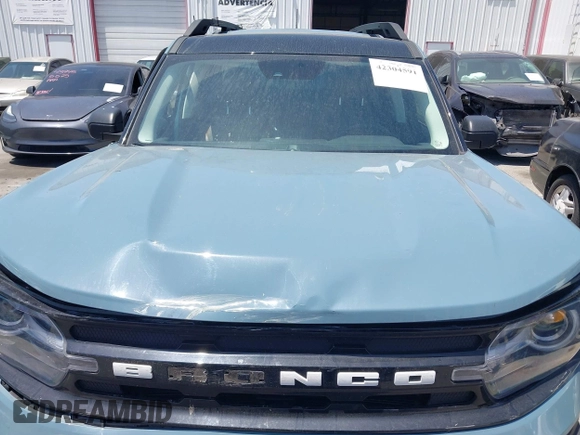 2023 Ford Bronco Sport Outer Banks z VIN 3FMCR9C62PRD61985, wystawiony jako IAAI lot #42304591 z przebiegiem 18 879 mil mil oraz . Historia ofert i sprzedaży dostępna na DreamBid. Obrazek 10.