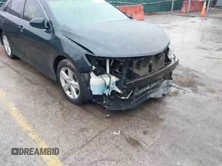 2012 Toyota Camry L z VIN 4T1BF1FK2CU144714, wystawiony jako IAAI lot #41867511 z przebiegiem 152 642 mil mil oraz . Historia ofert i sprzedaży dostępna na DreamBid. Obrazek 17.