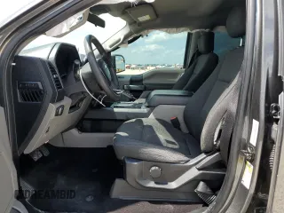 2019 Ford F-150 XL with VIN 1FTEW1CP3KKD25879, listed as a Copart auction lot 54385755 with 146,248 mi miles and Salvage title. Bid and sale history available at DreamBid. Image 7.