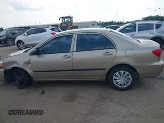 2007 Toyota Corolla CE with VIN 1NXBR32E77Z794521, listed as a IAAI auction lot 42094807 with 171,706 mi miles and . Bid and sale history available at DreamBid. Image 14.