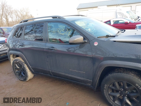 2017 Jeep Cherokee Trailhawk with VIN 1C4PJMBS4HW647852, listed as a IAAI auction lot 41192324 with 116,429 mi miles and . Bid and sale history available at DreamBid. Image 13.
