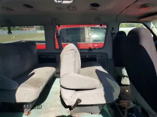 2004 Ford Econoline Passenger XL with VIN 1FMRE11L94HA90906, listed as a Copart auction lot 82408104 with Not provided miles and Non repairable. Bid and sale history available at DreamBid. Image 11.