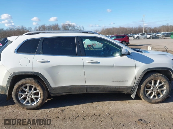 2016 Jeep Cherokee Latitude with VIN 1C4PJMCB1GW204412, listed as a IAAI auction lot 42031132 with 228,442 mi miles and . Bid and sale history available at carsss.com. Image 13.