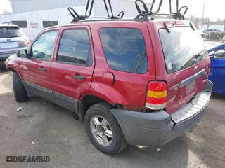 2006 Ford Escape XLT with VIN 1FMYU03116KC42851, listed as a IAAI auction lot 41667519 with 257,502 mi miles. Bid and sale history available at carsss.com. Image 3.