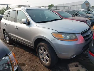 2009 Hyundai Santa Fe SE z VIN 5NMSH13E09H255761, wystawiony jako IAAI lot #42419450 z przebiegiem 252 937 mil mil oraz . Historia ofert i sprzedaży dostępna na DreamBid. Obrazek 1.