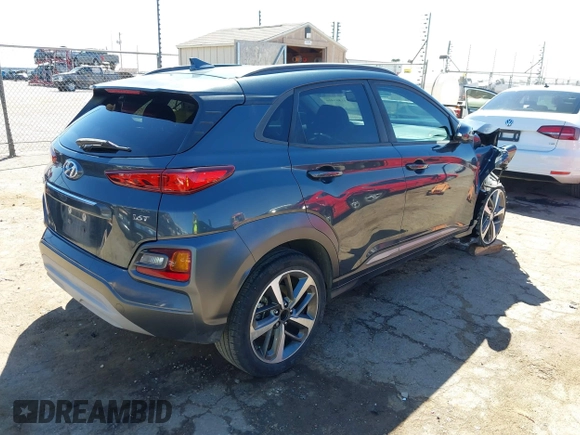 2019 Hyundai Kona Limited with VIN KM8K33A57KU223932, listed as a IAAI auction lot 41869416 with 102,424 mi miles. Bid and sale history available at carsss.com. Image 4.