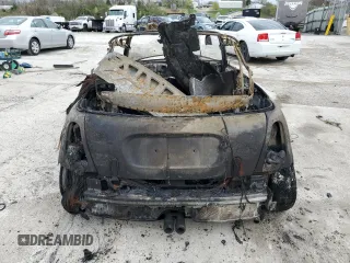 2006 MINI Convertible S with VIN WMWRH33536TK59031, listed as a Copart auction lot 51598825 with Not provided miles and Salvage title. Bid and sale history available at DreamBid. Image 6.
