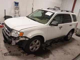 2012 Ford Escape XLT z VIN 1FMCU9DG4CKA72675, wystawiony jako IAAI lot #41212739 z przebiegiem 112 781 mil mil oraz . Historia ofert i sprzedaży dostępna na DreamBid. Obrazek 19.
