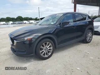 2020 Mazda CX-5 Grand Touring with VIN JM3KFBDM4L0738976, listed as a Copart auction lot 56683955 with 191,650 mi miles and Clean Title. Bid and sale history available at DreamBid. Image 1.