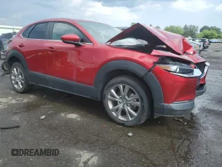 2020 Mazda CX-30 Select with VIN 3MVDMBCL8LM110690, listed as a Copart auction lot 63198125 with 67,180 mi miles and Salvage title. Bid and sale history available at DreamBid. Image 4.