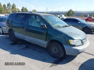 2000 Toyota Sienna LE with VIN 4T3ZF13CXYU312352, listed as a IAAI auction lot 42629403 with 166,361 mi miles and . Bid and sale history available at DreamBid. Image 1.