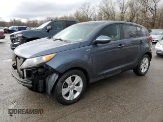 2012 Kia Sportage LX with VIN KNDPBCA25C7285039, listed as a Copart auction lot 52620735 with 197,305 mi miles and Salvage title. Bid and sale history available at DreamBid. Image 1.