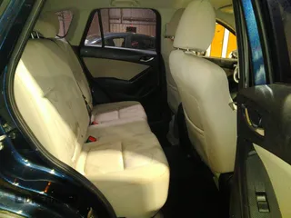 2016 Mazda CX-5 Sport with VIN JM3KE2BY5G0782385, listed as a IAAI auction lot 41971163 with 87,251 mi miles. Bid and sale history available at carsss.com. Image 8.