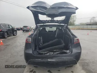2024 Tesla Model Y with VIN 7SAYGDED1RA321691, listed as a Copart auction lot 52153945 with 7,544 mi miles and Salvage Title. Bid and sale history available at DreamBid. Image 6.