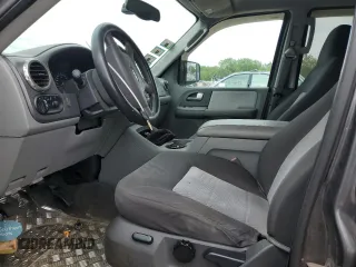 2004 Ford Expedition Special Service with VIN 1FMPU16L74LA55782, listed as a Copart auction lot 58326715 with 68,653 mi miles and Salvage title. Bid and sale history available at DreamBid. Image 7.