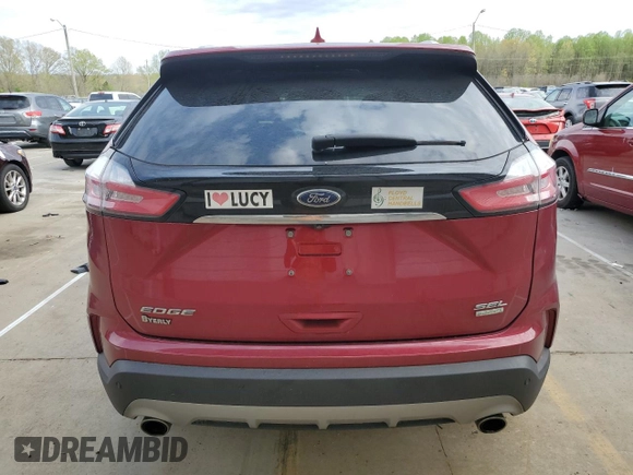 2019 Ford Edge SEL z VIN 2FMPK3J93KBC70523, wystawiony jako Copart lot #53424725 z przebiegiem 71 472 mil mil oraz Szkoda całkowita • Salvage title. Historia ofert i sprzedaży dostępna na DreamBid. Obrazek 6.