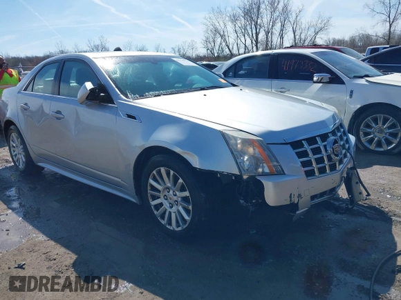 2013 Cadillac CTS Luxury z VIN 1G6DG5E56D0112860, wystawiony jako IAAI lot #41970874 z przebiegiem 125 647 mil mil oraz . Historia ofert i sprzedaży dostępna na DreamBid. Obrazek 1.