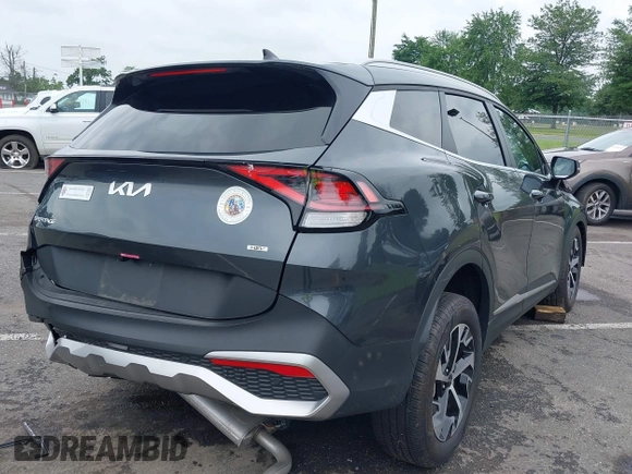 2023 Kia Sportage EX with VIN KNDPVCAG1P7110909, listed as a IAAI auction lot 42646436 with 16,304 mi miles and . Bid and sale history available at DreamBid. Image 4.