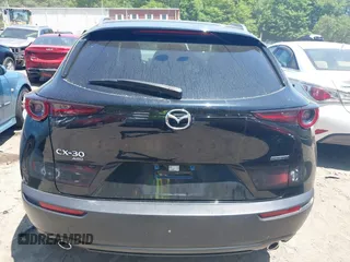 2022 Mazda CX-30 S Carbon Edition with VIN 3MVDMBCL3NM440188, listed as a IAAI auction lot 42259723 with 48,555 mi miles and . Bid and sale history available at DreamBid. Image 17.