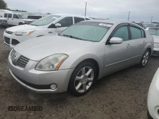 2004 Nissan Maxima SE with VIN 1N4BA41E14C889912, listed as a Copart auction lot 74379814 with 0 mi miles and Salvage Title. Bid and sale history available at carsss.com. Image 1.