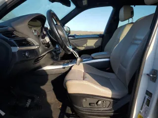 2012 BMW X5 35i with VIN 5UXZV4C55CL747778, listed as a Copart auction lot 84335374 with 144,258 mi miles and Non repairable. Bid and sale history available at DreamBid. Image 7.