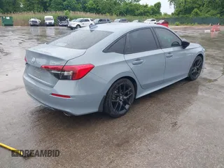 2023 Honda Civic Sport with VIN 2HGFE2F54PH512202, listed as a IAAI auction lot 42331949 with 44,568 mi miles and . Bid and sale history available at DreamBid. Image 4.