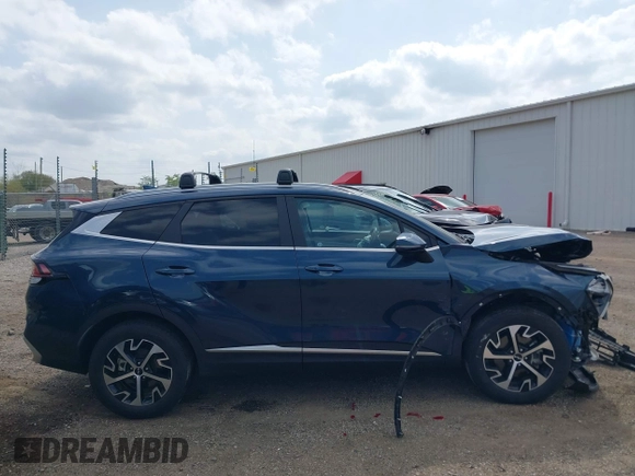 2023 Kia Sportage EX with VIN KNDPVCAGXP7104090, listed as a IAAI auction lot 42144158 with 26,983 mi miles and . Bid and sale history available at DreamBid. Image 14.